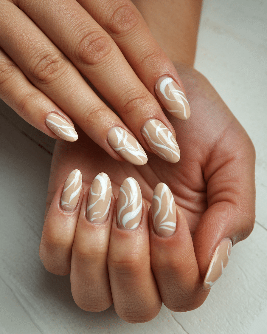 0002_1_a-still-image-of-a-hand-with-short-almon_b6zwzM-NQNSvjxm7AvCVQQ_tvHS8A76TR6Wdy3bzjIWog The Short Almond Nail Trend That’s Taking Over 2025