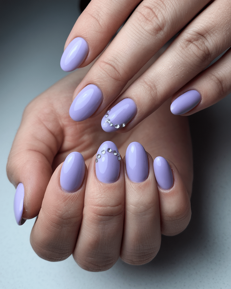0014_3_a-photo-of-a-hand-with-nails-painted-in-_alIzxMliQHKLKQMRdA81VA_uealusxeTEKFSDEgnyA1iQ_cover The Short Almond Nail Trend That’s Taking Over 2025
