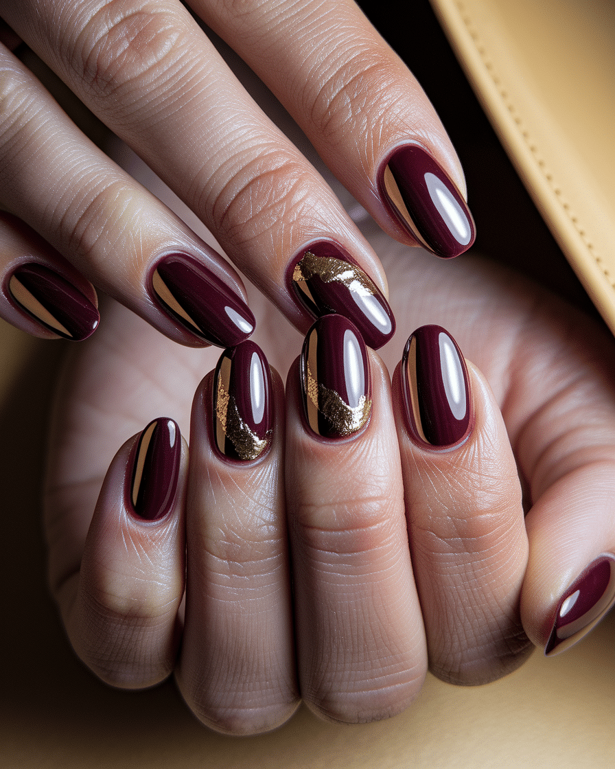 0006_3_a-close-up-photograph-of-a-beautiful-han_aBpGNZ6QR_OEU5RMgpA-nQ_UNLJUIOLSEmOFMnwfmk4xA Winter Nail Colors That Make a Statement: Burgundy and Gold Nails to Warm Up the Season