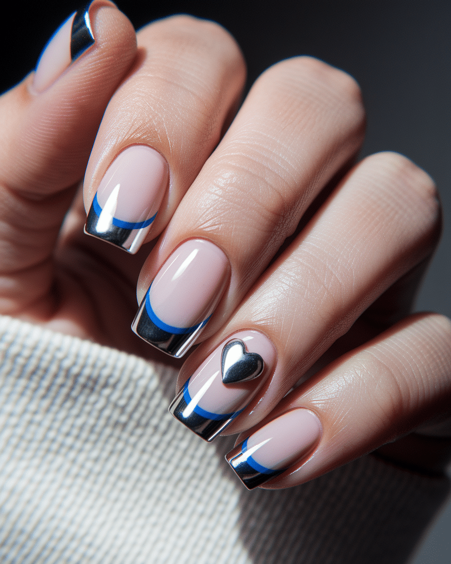 Elegant Minimalist Nail Trends with Blue French Tips and Heart Accents
