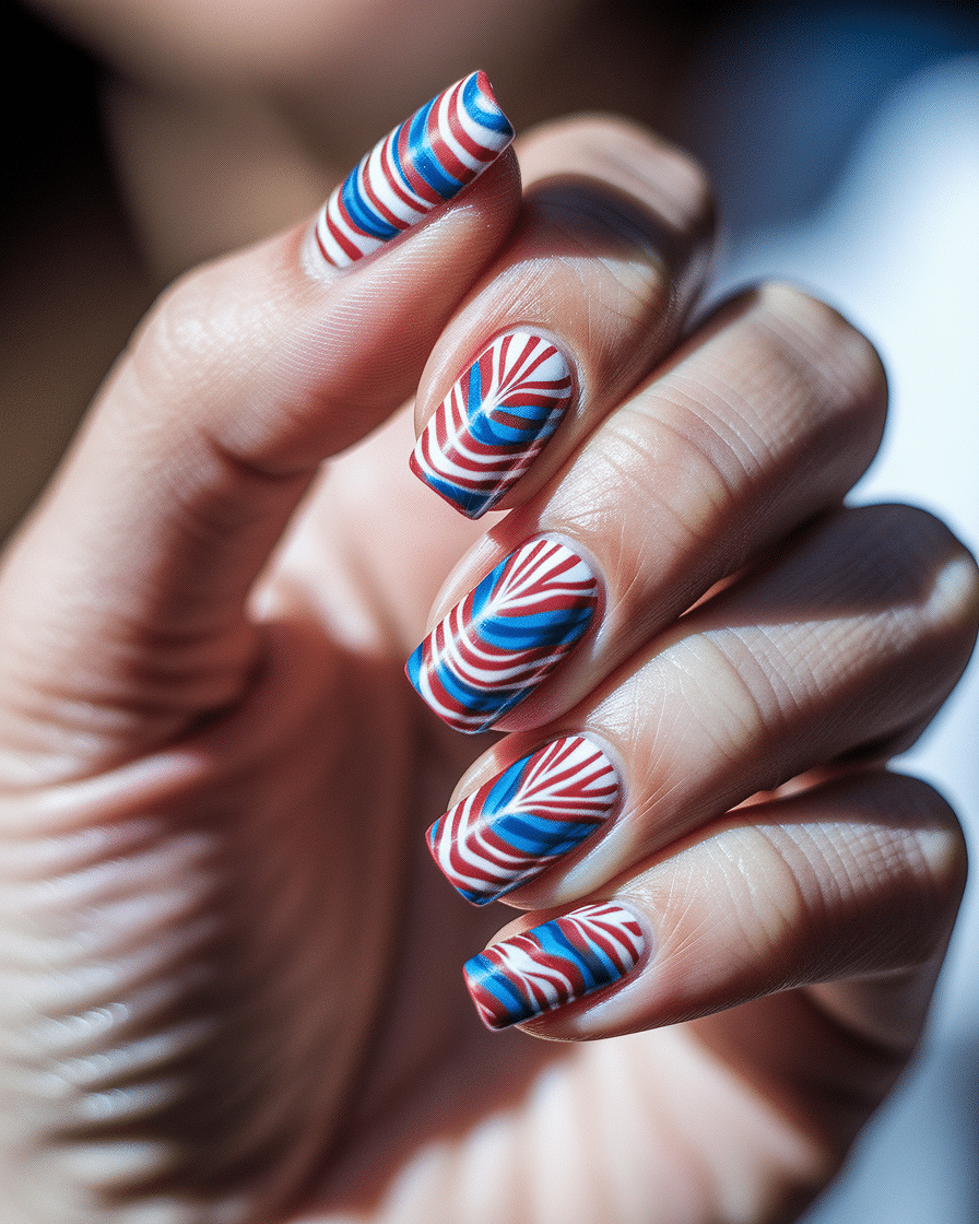 0007_3_a-close-up-photograph-of-a-hand-with-ele_q1z1ui3zTnCbs8L7yuP2YQ_bYS1mYKeQKmyV3Lqth3LVQ Celebrate in Style with Patriotic Summer Nail Designs