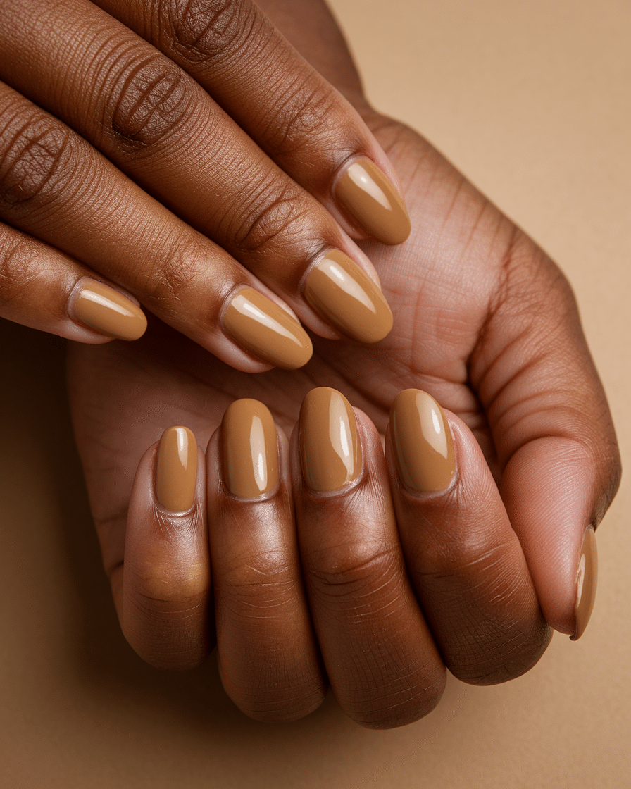 0011_1_a-close-up-shot-of-a-hand-with-caramel-c_1-yV3WTqQCaXrk58MzMkZA_rFx83XeTRQmwGlvY_8XYoA The Prettiest Nail Colors to Wear This Spring