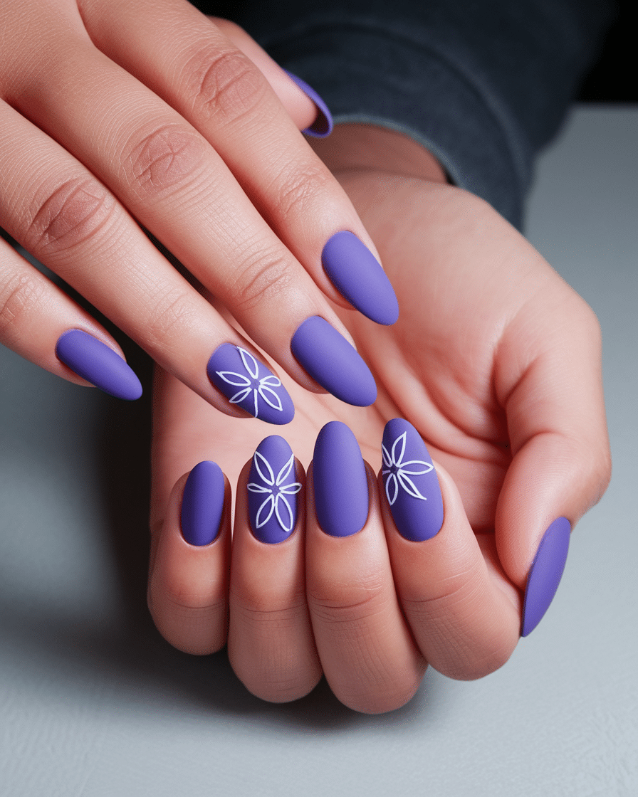 0011_3_a-still-image-of-a-beautiful-hand-with-m_pQYjYJlVRlucoHyCLPxGpQ_fju2gTJsQP28KIGqXCUJyg Blooming Beauty: The Timeless Charm of Purple Floral Nails