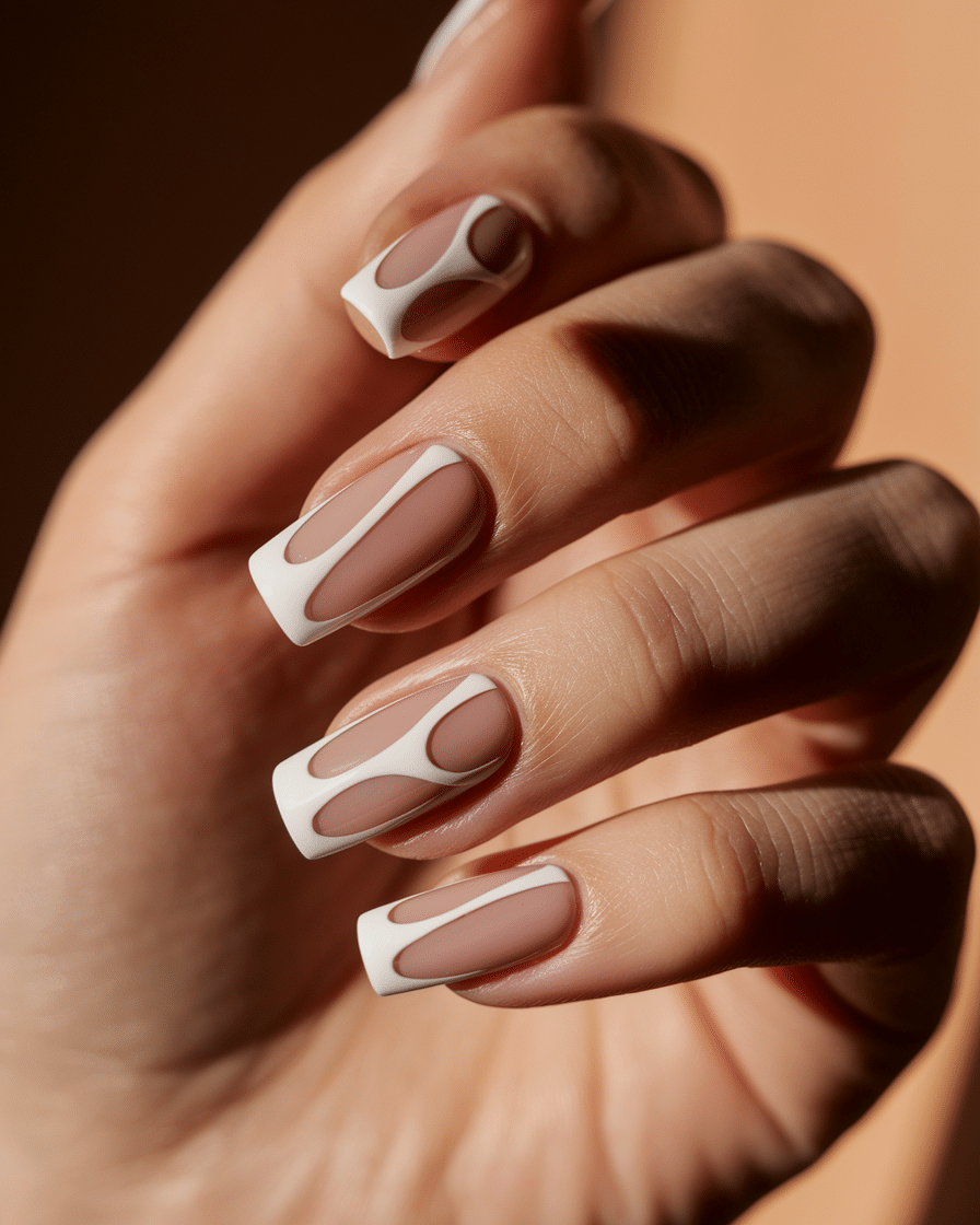 0014_1_a-close-up-photograph-of-a-beautiful-han_B7cU04MmSSGEZGU3l7HvbA_H43AQ7tdQci_xhw6xLAQRA The Modern Revival of French Tip Nails: Stylish Designs for Every Season