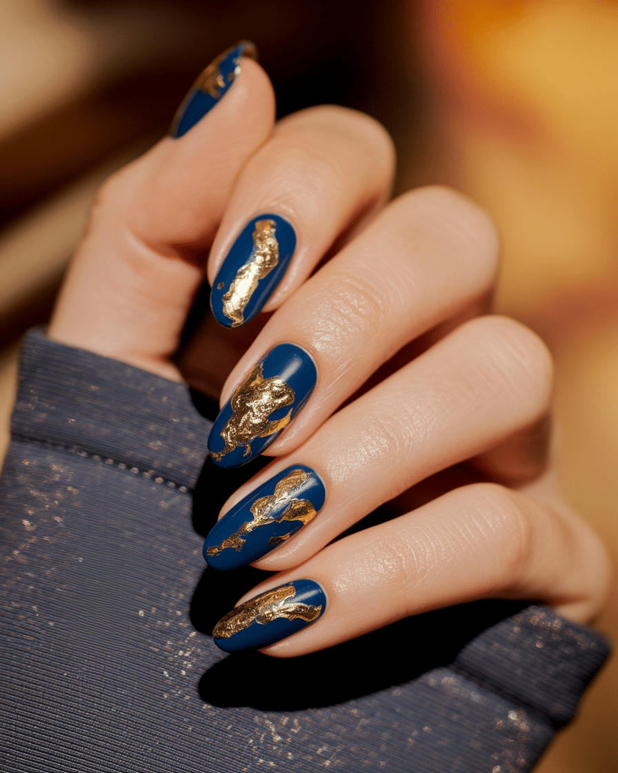 0015_1_a-close-up-still-of-a-beautiful-hand-wit_2ZImxX9XRPetTdL3awqrFg_UW4dXEuMTLC05f71Mo1QCw The Perfect Spring Manicure: Why Blue Nails Are the Season’s Freshest Trend