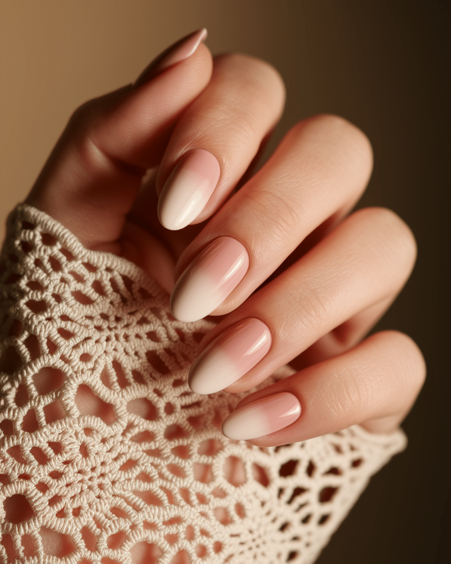 0018_1_a-delicate-hand-with-nails-painted-in-a-_4SQAh_i0TqeSx-ZVY40guA_lqTVXEOZQzScAZ01CrAQRQ_cover The Allure of Almond Nails: Why This Timeless Shape Continues to Reign in 2025