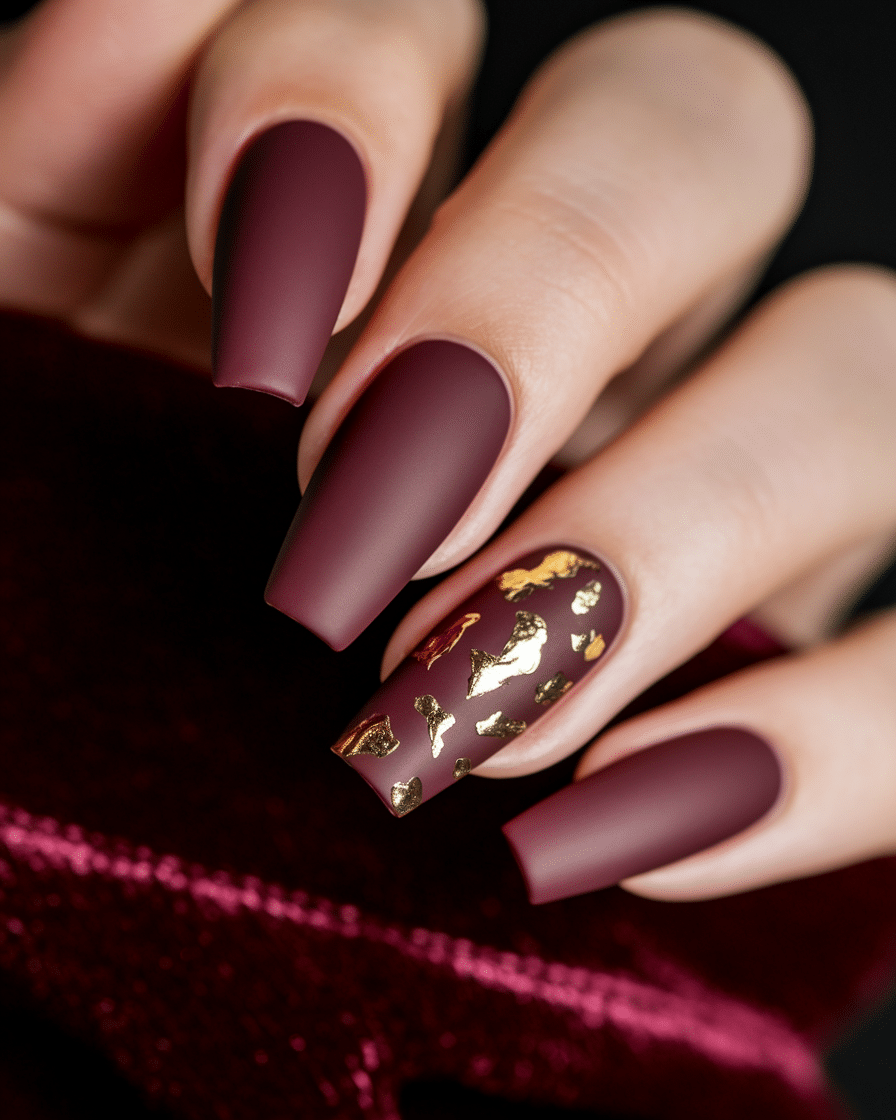 0019_1_a-close-up-photograph-of-a-beautifully-m_1Zu6EejKQeq26zaE9VaUCg_f7rHW9fnRNCBBEKsNaj96w_cover Winter Nail Colors That Make a Statement: Burgundy and Gold Nails to Warm Up the Season