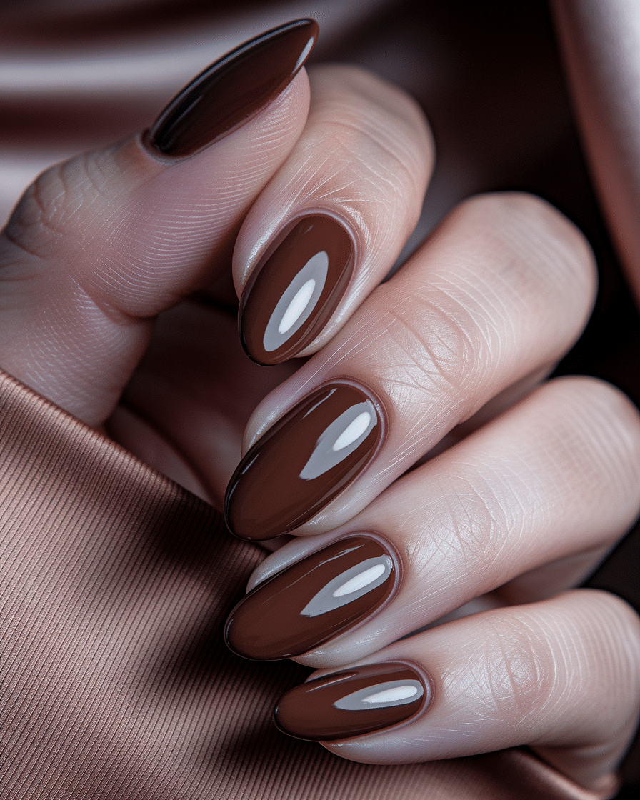 0019_3_a-close-up-photograph-captures-the-exqui_b09s3XmuRy6f37dluWIU4w_jzhhikNkTui11KVc1LWk-A The Timeless Allure of Brown Nail Designs