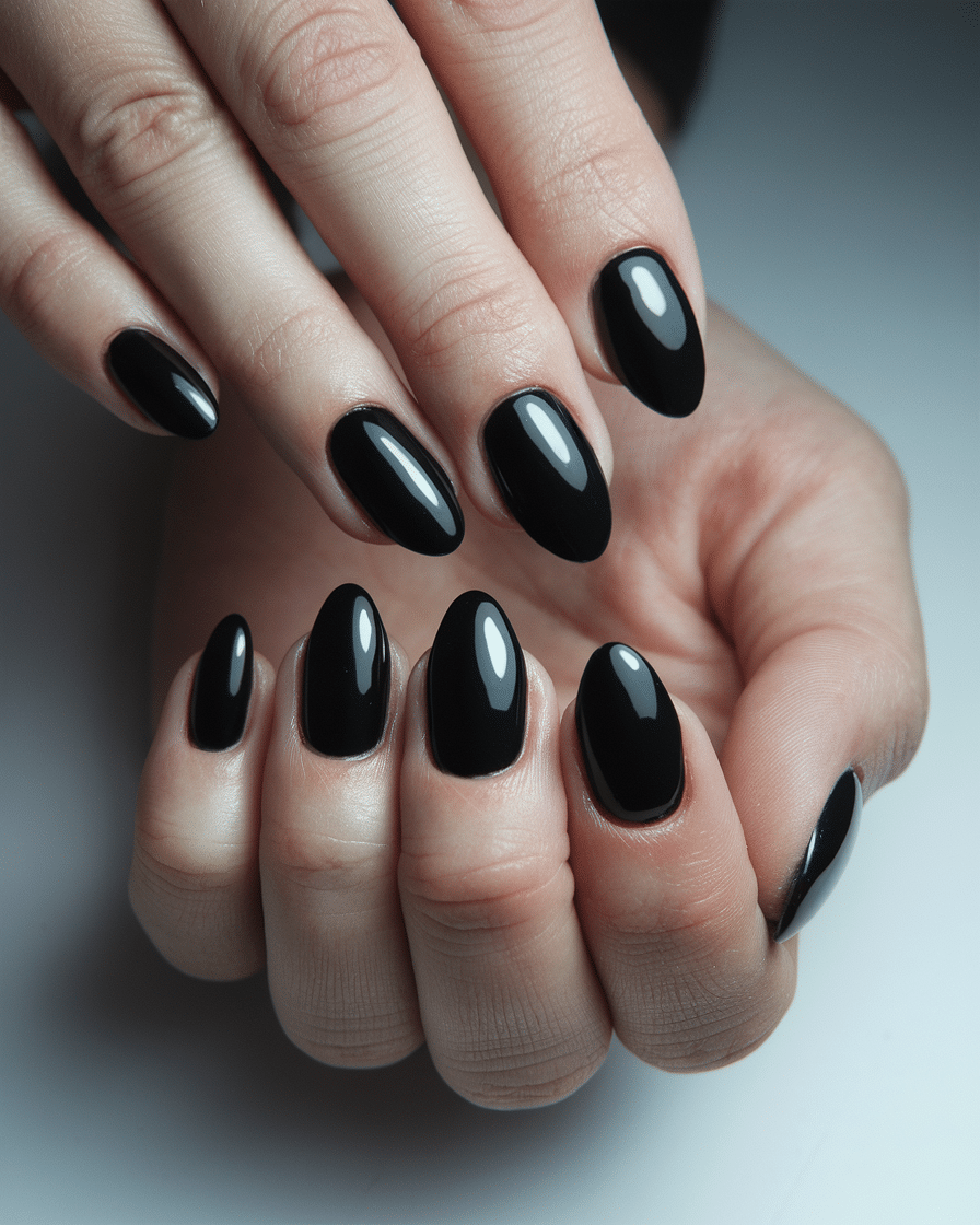 0019_4_a-photo-of-a-hand-with-glossy-black-almo_r3YUstO7QFC7X5uXByzA3A_kCnlGyYvRZ6tgxM8589mTQ The Timeless Allure of Black Nail Designs