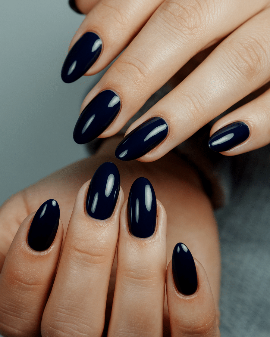 0020_2_a-still-image-of-a-beautiful-hand-with-c_f7i9Pqq9T8-FLEhRB-8u5A_vO4jMQGfR8S76lOInijxZA_cover Glam in Every Shade: Why Navy Nails Are the Unexpected Star of Modern Manicures