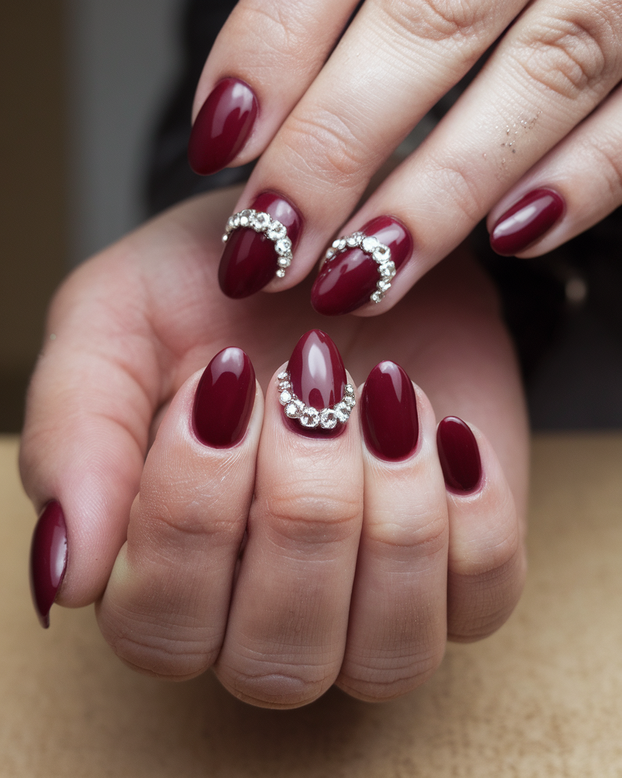 0001_3_a-photo-of-a-hand-with-garnet-red-nails-_Sy9A_dFAT1OmdJSD8_AESw_rdaBW4SjSa2n3hqR1VMGVw Vintage Red Nail Ideas That Never Go Out of Style