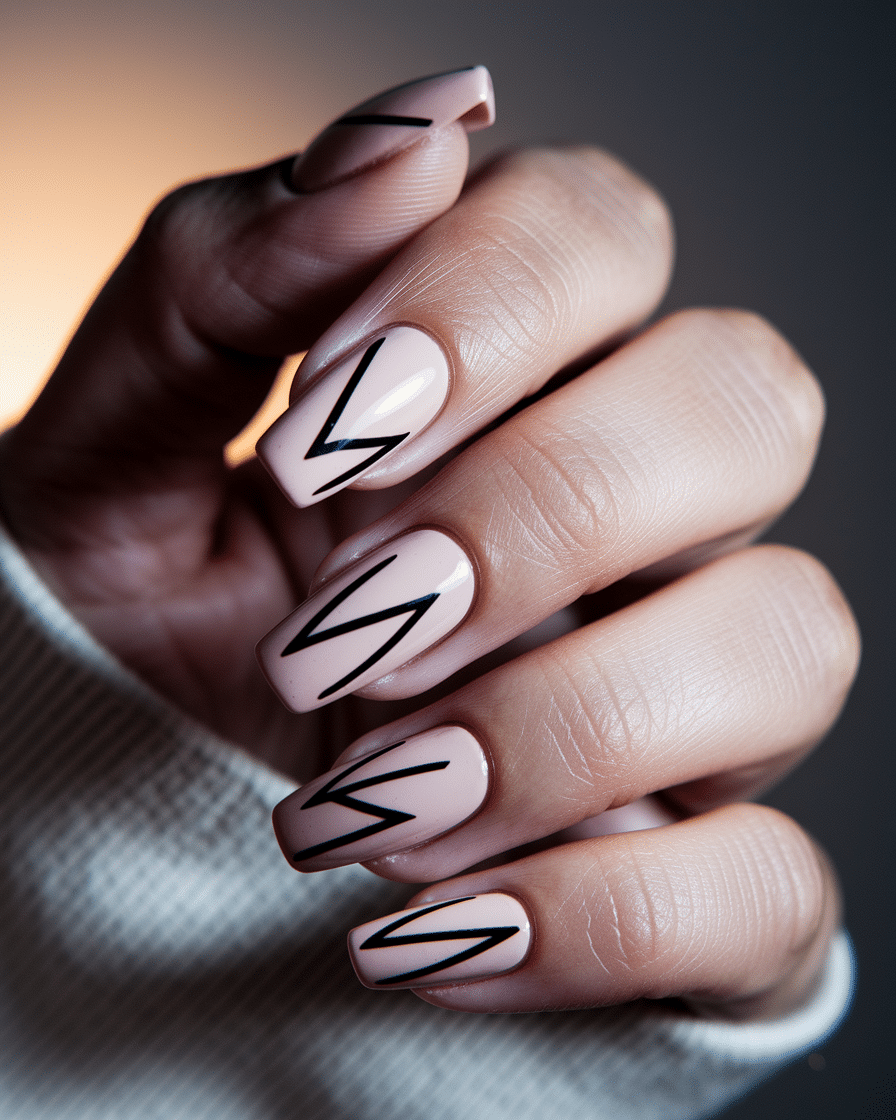 Elegant Contrast: Exploring the Beauty of Black and Nude Nail Designs