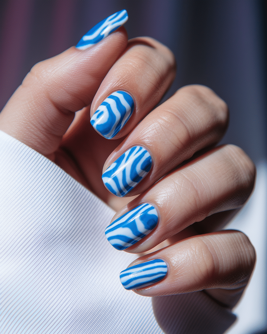 0003_3_a-close-up-photograph-captures-the-intri_q4LwxkJ7SASLsKXcuhztbg_schfsORtSFGaj6B3cn39aw Blue Nail Designs That Are Perfect for a Stylish Summer Look