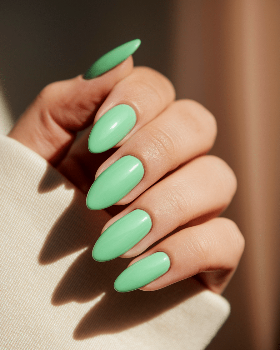 0006_1_in-a-close-up-photograph-a-hand-with-per_GcfyW_fFRVajFL8VphGG4Q_BTqGyWL4TAe6PhH0b2DwkA_cover Cute and Simple Summer Nail Designs for Almond Shaped Nails