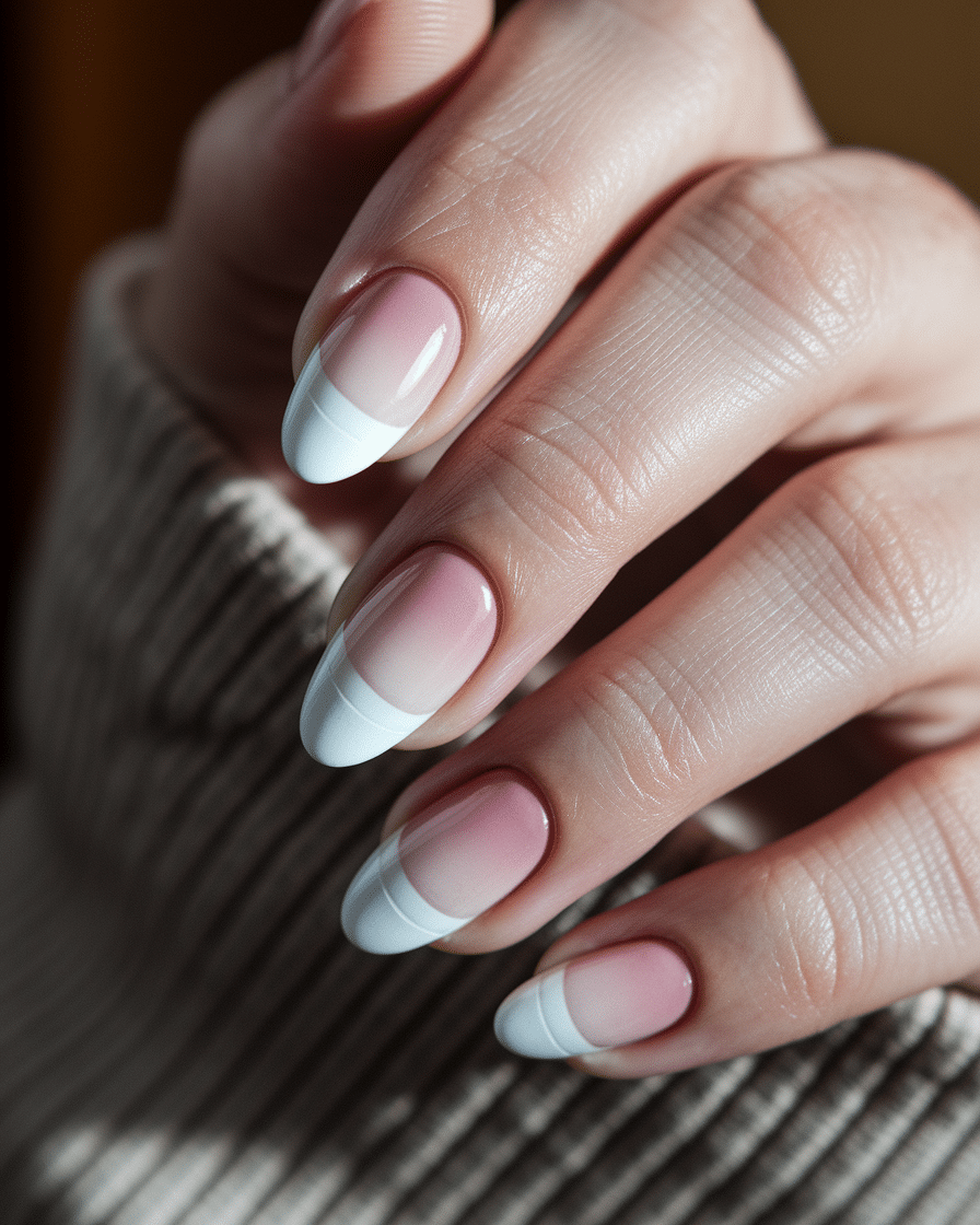 0006_3_a-close-up-photograph-captures-the-intri_U0bwYPSvQDmTSLml5nNyew_a0BFlIEaSK-gzZHlM7bHJQ_cover Timeless French Nail Designs for a Modern, Elegant Manicure in 2025