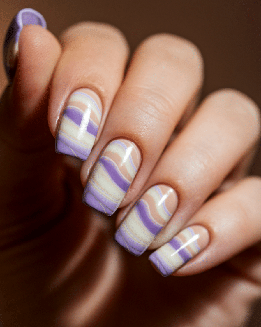 0008_1_a-close-up-photograph-of-a-hand-with-ele_C39jJiKsRtCNydqo3V0A3g_65nI-dYHTKKZ4sPBp5-55g_cover Blue Nail Designs for a Fresh, Modern Look in 2025
