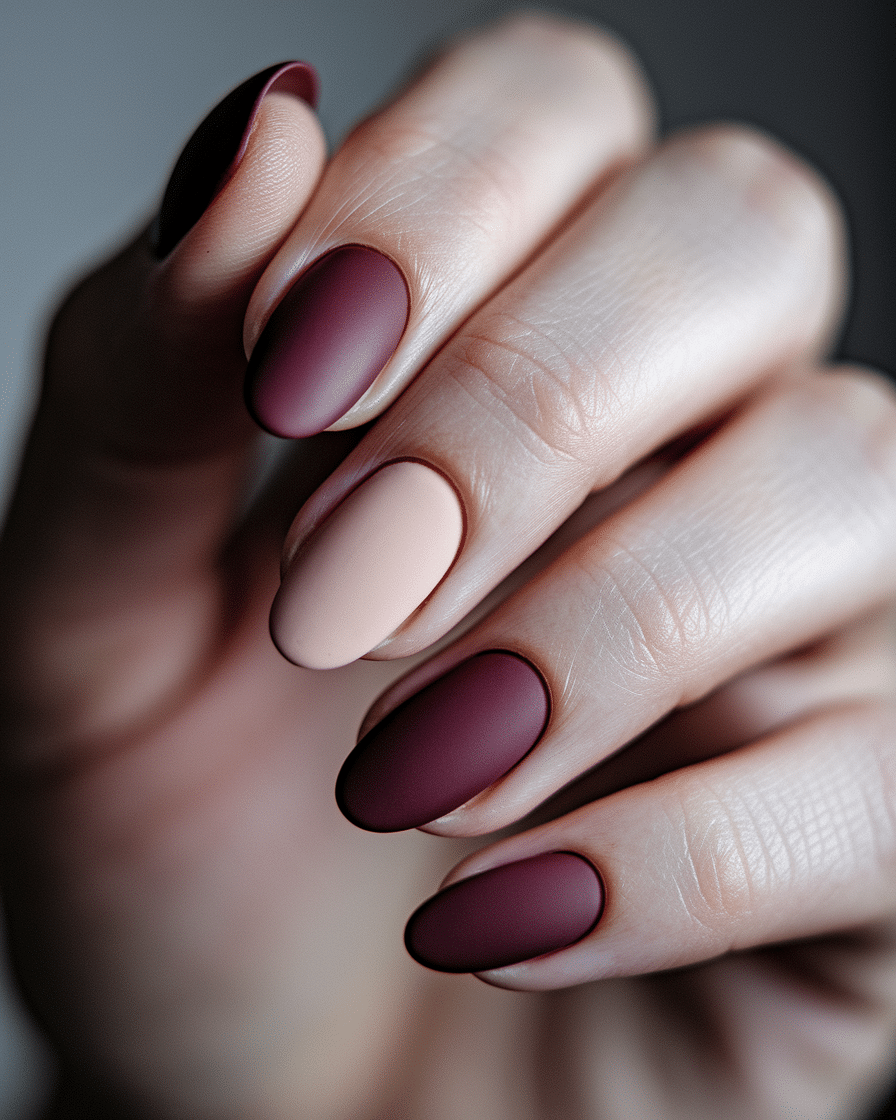 0008_2_a-close-up-photograph-captures-the-intri_CMA4IuWKSA28BmhepFRD_w_fylKBnJHRJK9UxYBydDfhA Elegant Nail Trends for Fall and Beyond: Why Matte Burgundy Almond Nails Are a Timeless Choice