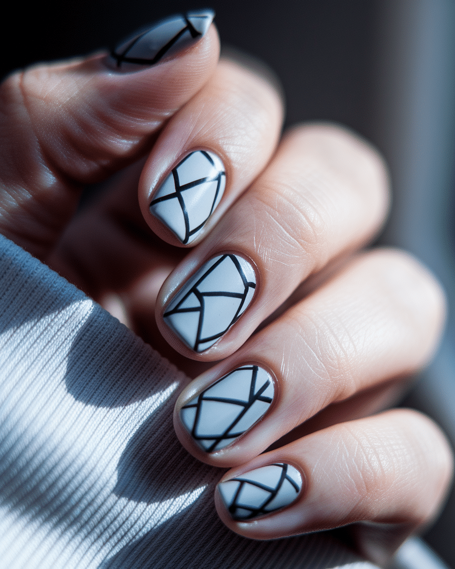 0009_3_a-close-up-photograph-captures-the-intri_s-F5AzMOQiSakKytT5uIqw_W2Zy8tf-SzWQUZ6lhfRsbg Elegant and Modern Nail Designs for a Timeless Look