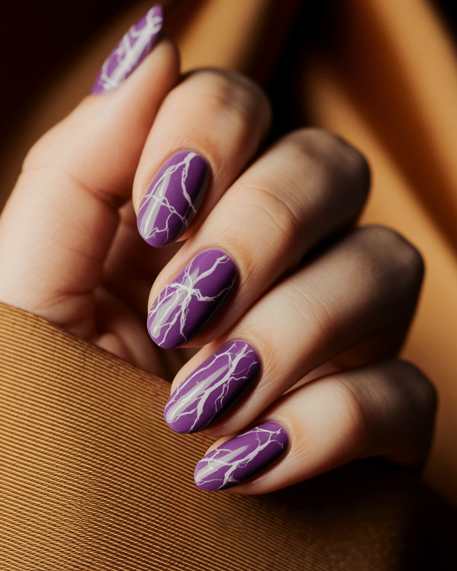 0016_1_a-close-up-photograph-of-a-beautiful-han_BVYWUEAESJO1dINQIgNeYw_-vk3p7b3TxexTv_PxSEXhw_cover The Beauty of Purple Nails: A Perfect Blend of Boldness and Elegance