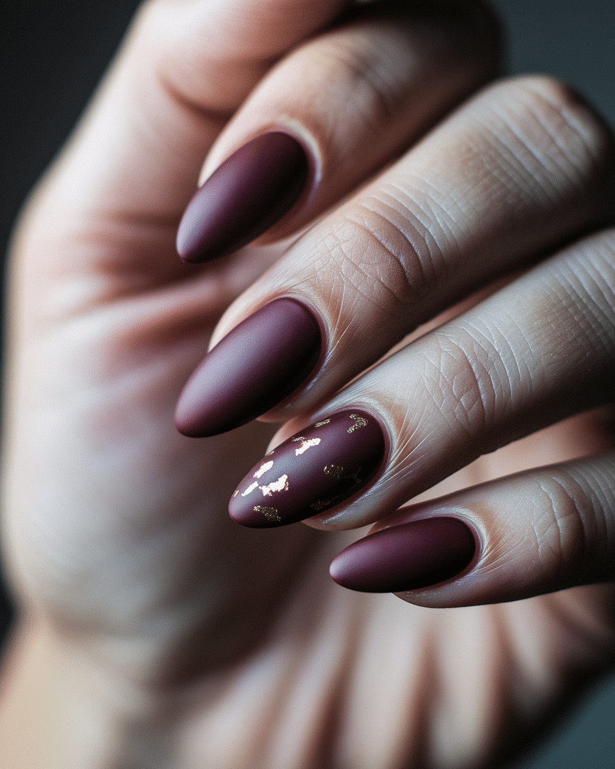 0001_2_a-close-up-photograph-captures-the-intri_FvTNTJy_R8KLzXZpZfWV4w_3QjiYJj8Q1S6odczF65Syg_cover Elegant Nail Styles for Every Season: Matte Burgundy Almond Nails You’ll Adore