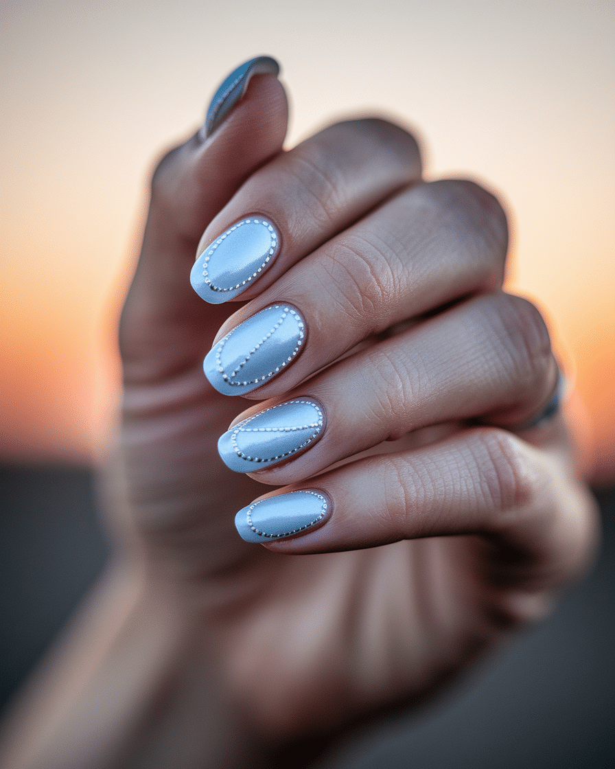 0003_3_in-a-close-up-photograph-a-hand-graceful_WLzfqCYZT8Sk1VQ6Pw2HLA_WPSSNcfZQ8qp4z8J7IEaUA Soft Blue Aura Nails: A Delicate and Dreamy Trend for Every Season