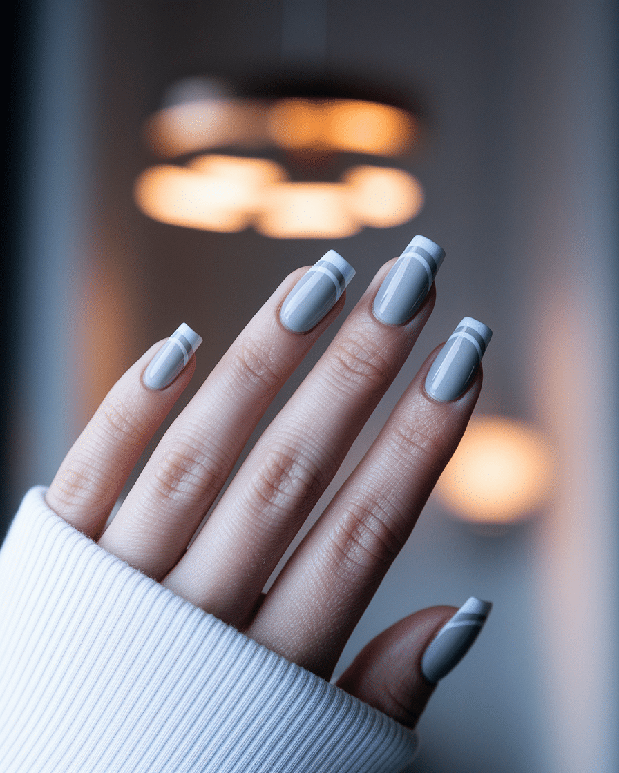 0006_3_a-close-up-photograph-captures-a-delicat_JOxTovi2QUaxA9BgY32G9w_mF_gNU3CTu2mRUPIaUDOag The Best Gray Nail Colors for a Chic and Modern Manicure