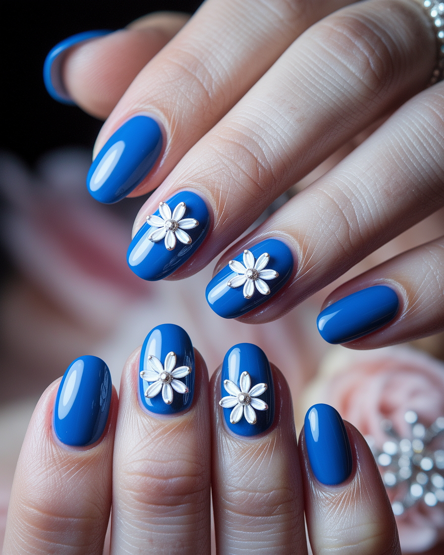 0007_2_a-close-up-photograph-captures-the-elega_OBh7K8TnTLmz-UXrfzaq1Q_5AkGNKDtR7Cn_ikrDmjuQg Elegant Floral Nail Designs in Blue for a Modern and Fresh Manicure