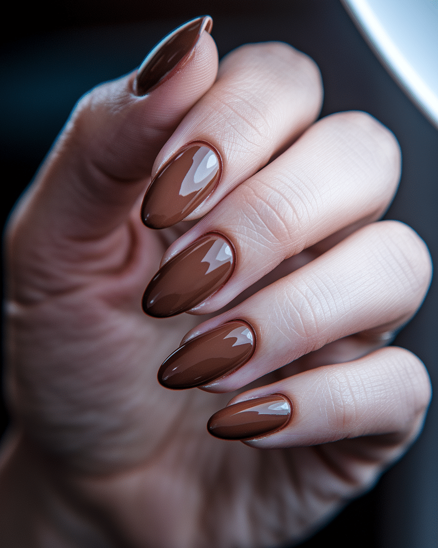 0009_2_a-close-up-photograph-of-a-beautiful-han_RARGNhIiQNCeefDcRC08WQ_AGwUzGeUQg2O5GIfxWYnfQ Best Chocolate Nail Designs for a Glossy and Delicious Look