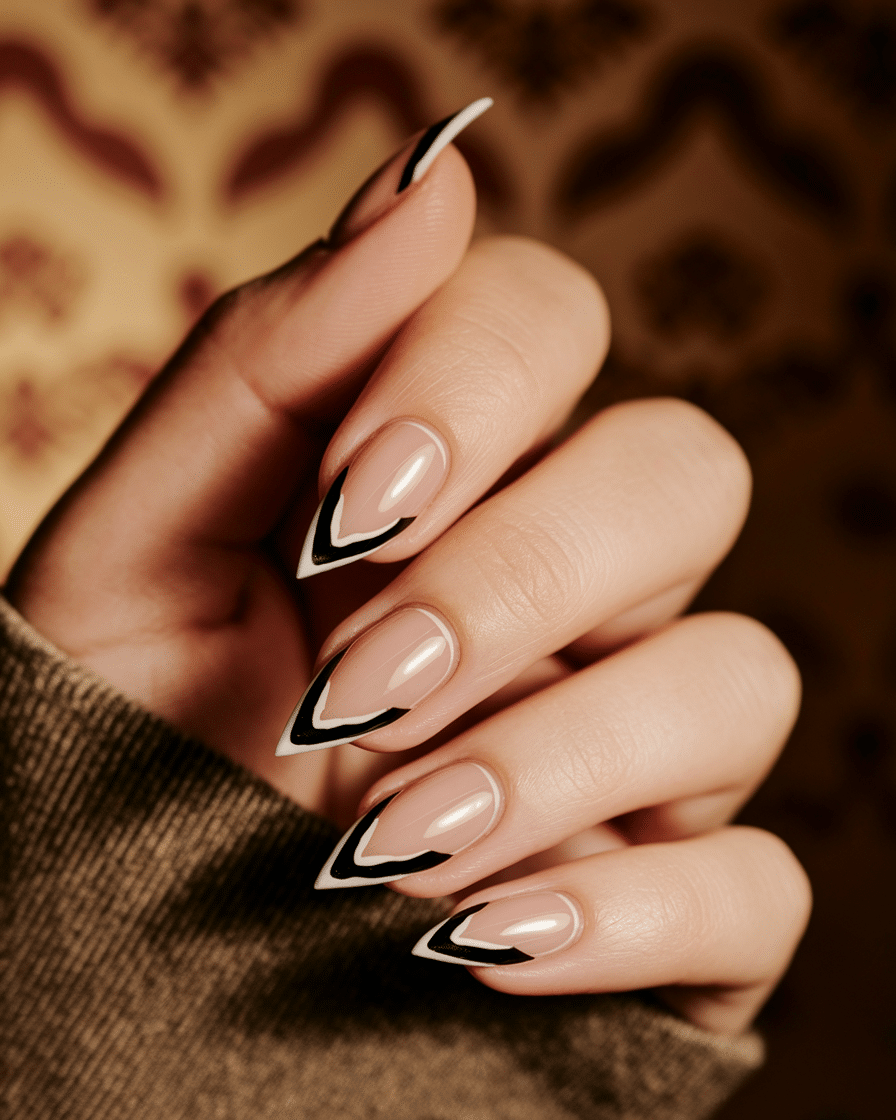 0011_1_a-close-up-photograph-captures-the-intri_5hDjK69YRnqAK7DZzB8x7A_7U4bPHyXTB6TUhHeZB0FcQ_cover Elegant Nail Art Trends with Geometric Designs in Black and Nude